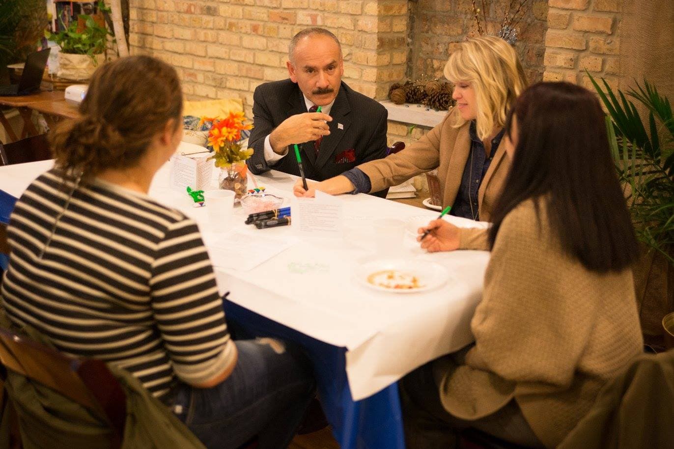 Community members gathered at an Anne's Haven program