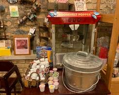 Kitchenette amenities including a popcorn popper and refreshments