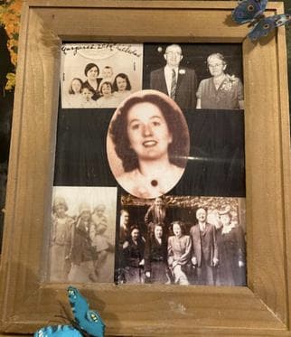 A framed collage of vintage family photographs at Anne's Haven